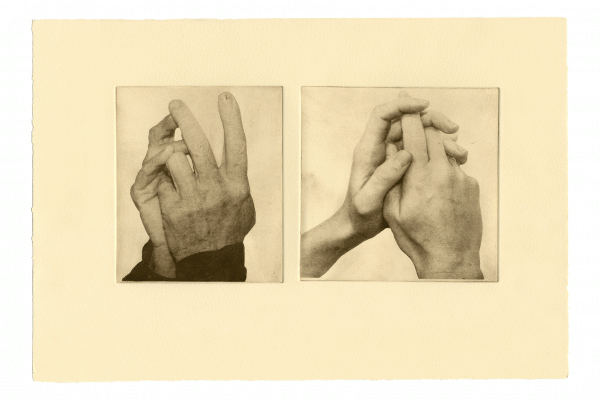 photogravure double  print of two different clasped hands